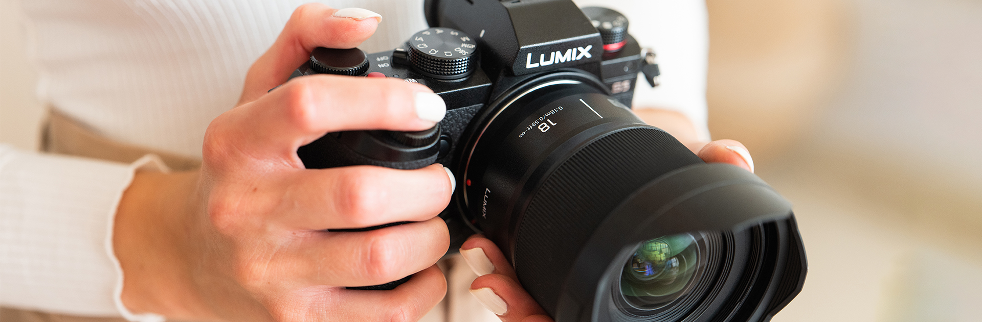a person holding a camera